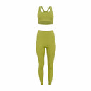 Green athletic crop top and leggings set on a white background